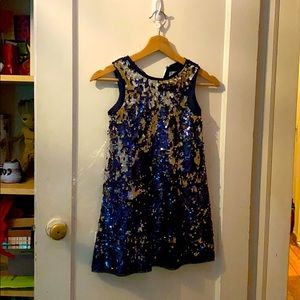 A sequined party dress for children.